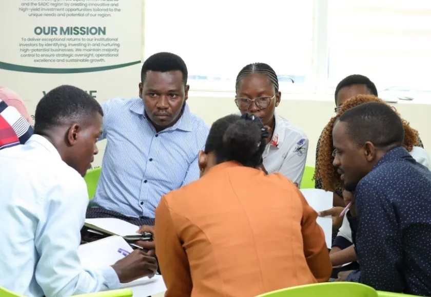 Entrepreneurs working together at a DukaHuru workshop